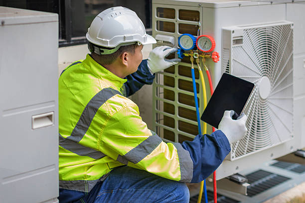 Professional Air Conditioning Repair technician working in Linden, TN